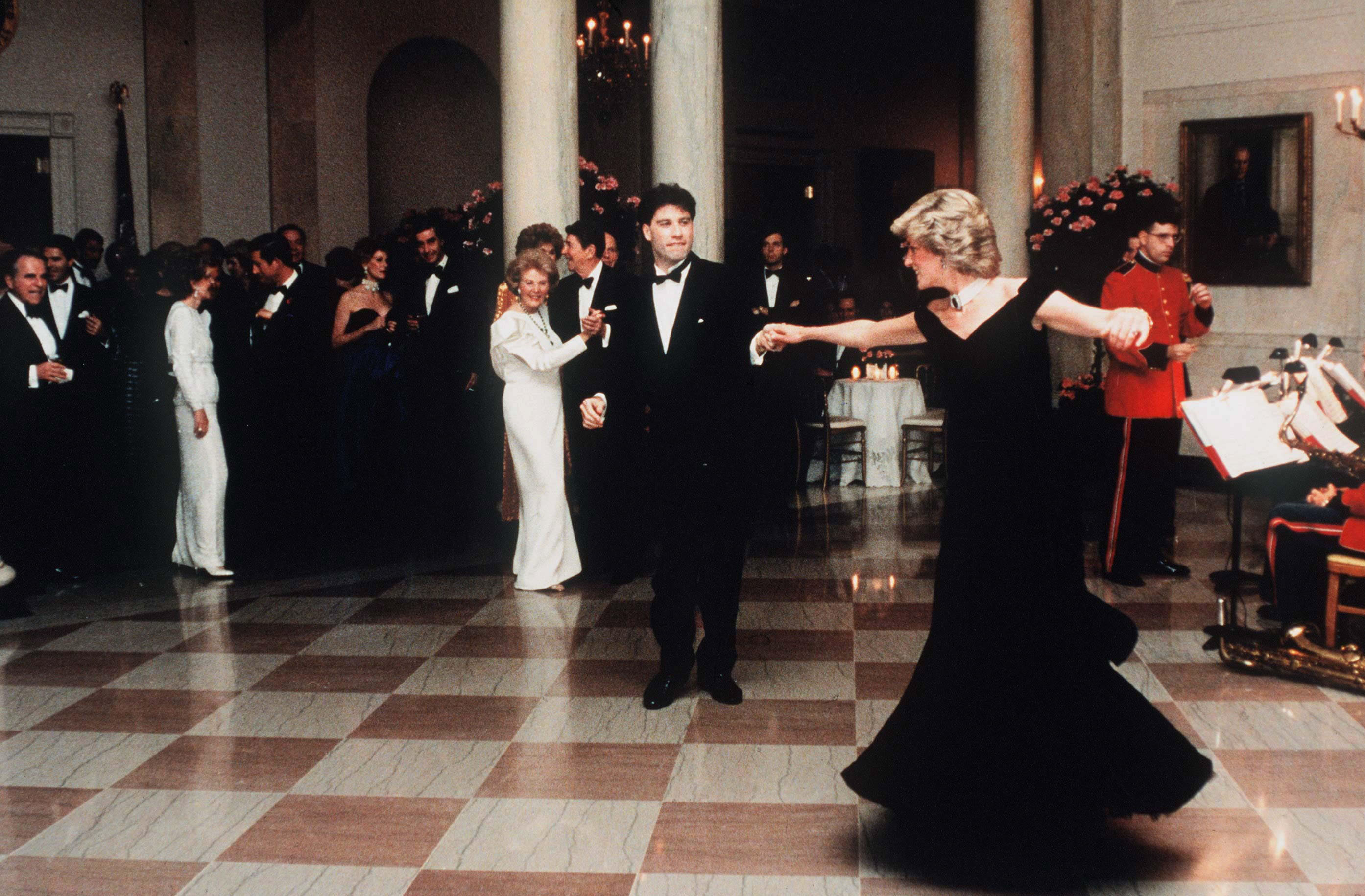 (FILE) 10 Princess Diana Dresses Up For Auction Diana And John Travolta Dance