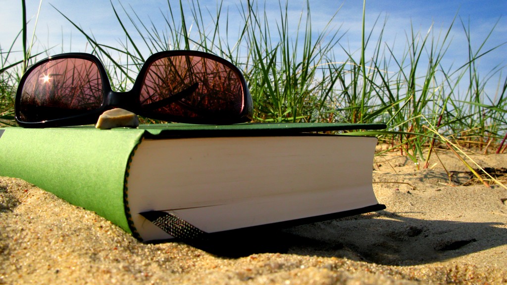 Reading-Books-On-Beach-Hd-Desktop-Wallpaper
